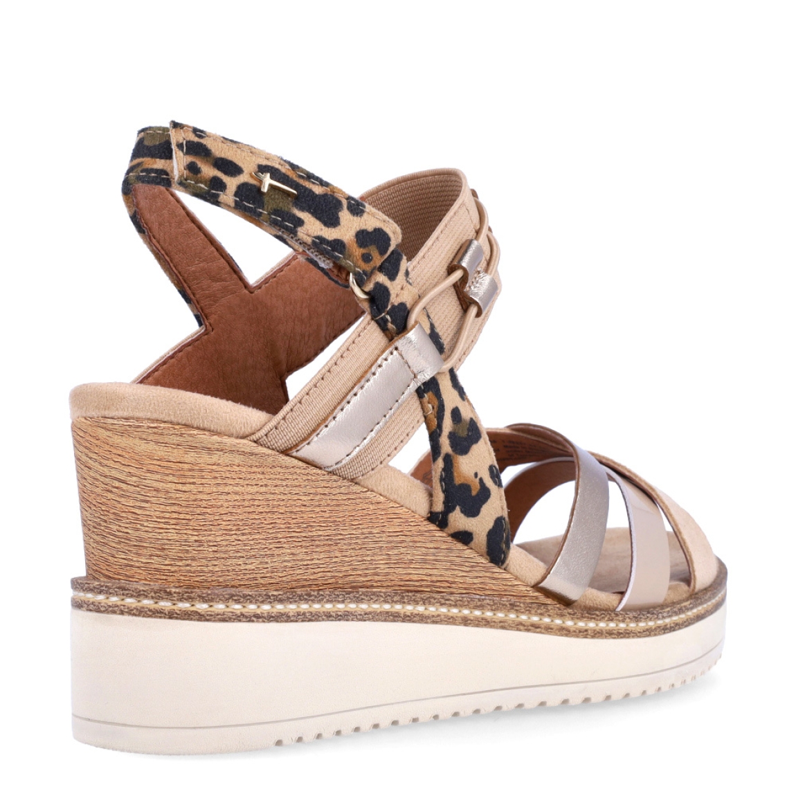 Sandalias de la marca Tamaris, modelo MINAH. Exterior en piel ante color marrón con estampado animal print y tiras cruzadas en pala. Interior en piel color marrón. Cierre de las sandalia Tamaris con velcro en tobillo y cuña de 8cm de altura. Estas sandalias Tamaris MINAH son ideales para ir a todos lados, con ellas lucirás un estilo único!