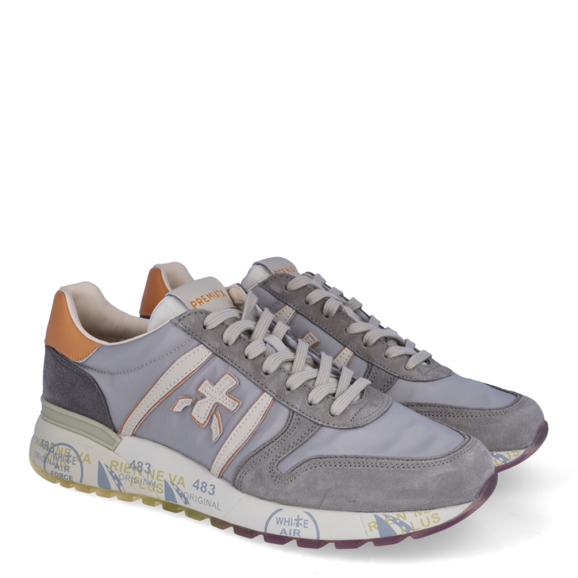 Deportiva de la marca Premiata, modelo LANDER. Exterior en ante y nylon de color gris, con detalles en piel de color naranja. Interior en piel de color blanco. Cierre con cordones de color gris. Suela de goma de 3 cm de cuña. Plantilla acolchada para garantizar la máxima comodidad en cada paso.