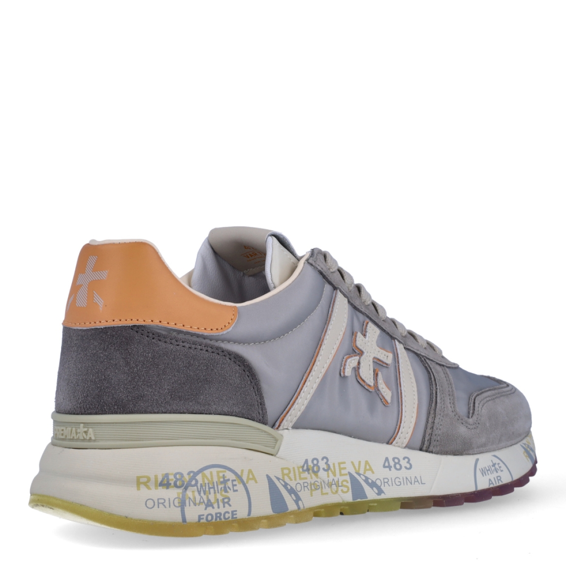 Deportiva de la marca Premiata, modelo LANDER. Exterior en ante y nylon de color gris, con detalles en piel de color naranja. Interior en piel de color blanco. Cierre con cordones de color gris. Suela de goma de 3 cm de cuña. Plantilla acolchada para garantizar la máxima comodidad en cada paso.