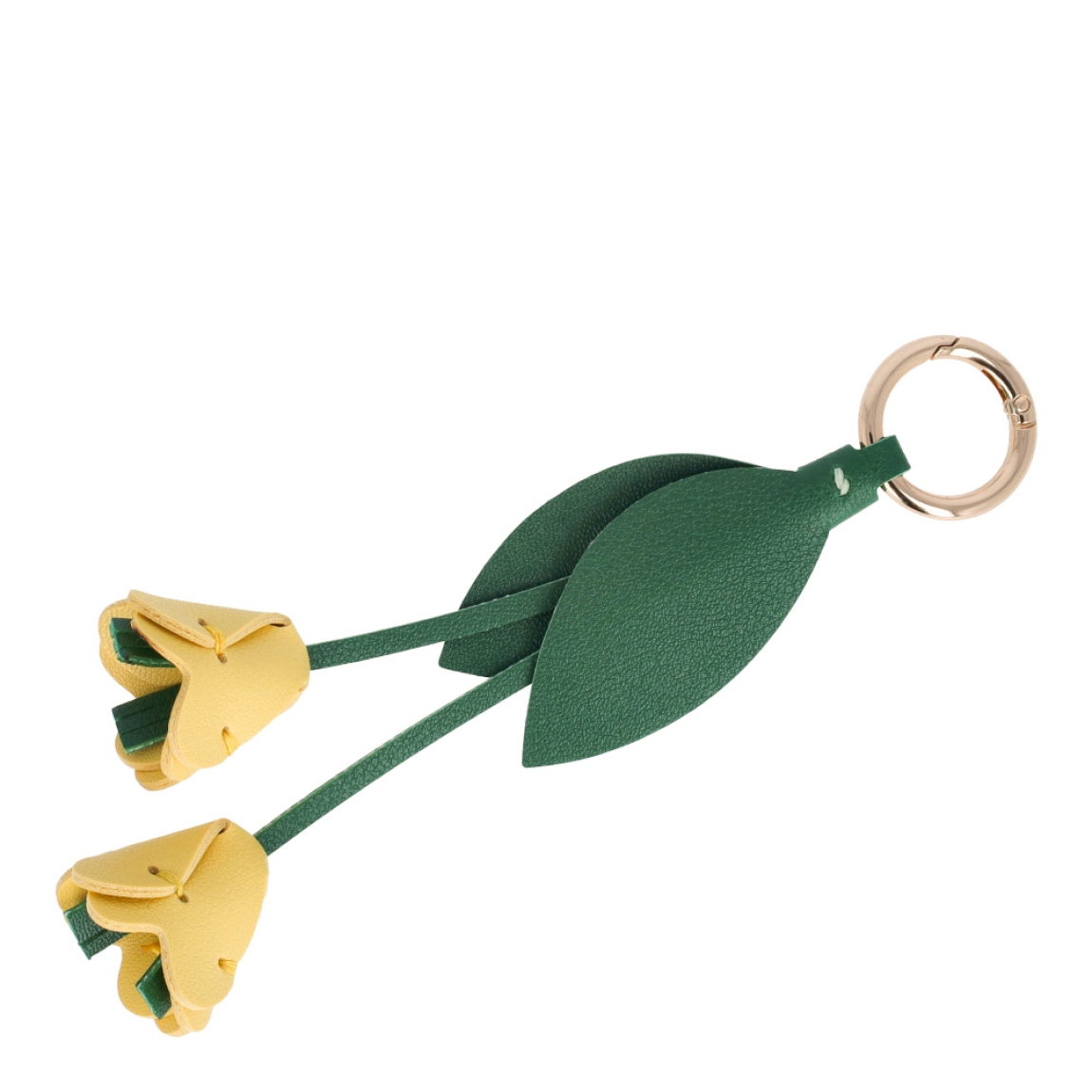 Llavero de rosas color amarillo de la marca Sons, elaboradas en piel, cosidas a mano. Llavero ideal combinable con diferentes bolsos, accesorio perfecto para ti!