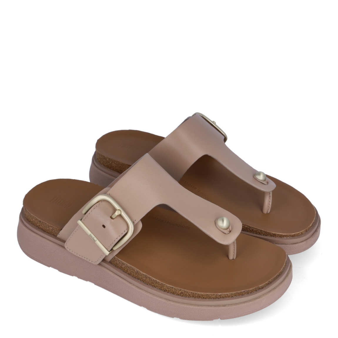 Sandalias de la marca Fitflop, modelo GEN-FF. Exterior elaborado en piel color nude. Interior en piel color camel. Cierre de sandalias fitflop con doble hebilla en la pala de color dorado. Suela como cuña de 4cm de atura. Estas sandalias Fitflop GEN-FF son ideales para esta temporada!