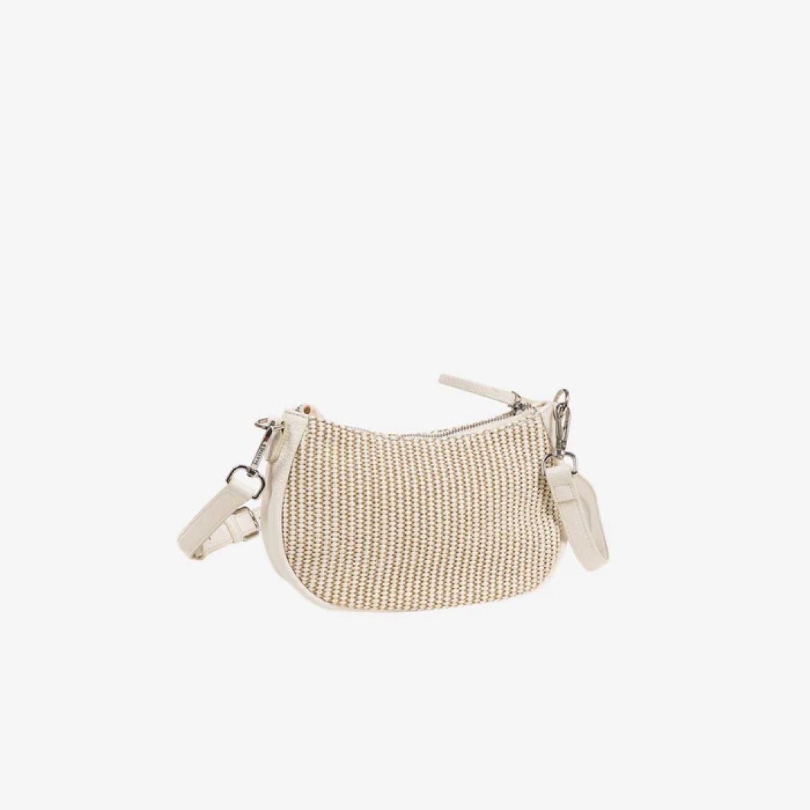Bolso de la marca Matias Salva, modelo NIJAR. Elaborado en rafia color beig. Interior de forro textil con un bolsillo cerrado con cremallera. Tiene asa de hombro. El asa auxiliar tipo bandolera cuenta con mosquetones para su fácil colocación. DIMENSIONES: 24x14x07 cm. Este bolso es ideal para llevarlo a todos lados!