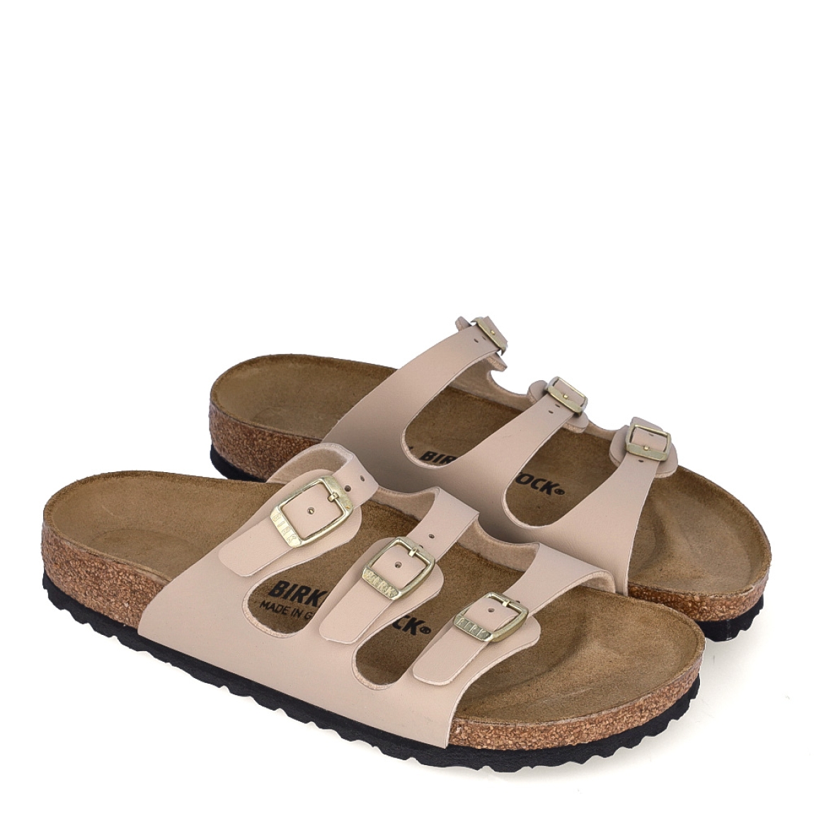 Sandalias de la marca BIRKENSTOCK, modelo FLORIDA. Elaborado en piel color camel, con tres correas estrechas con ajuste individual gracias a las robustas hebillas de metal, la sandalia ofrece además buena sujeción y se adapta de manera individual a todas las formas de pie. Suela plana y de goma. Estas sandalias BIRKENSTOCK FLORIDA son ideales para esta temporada!