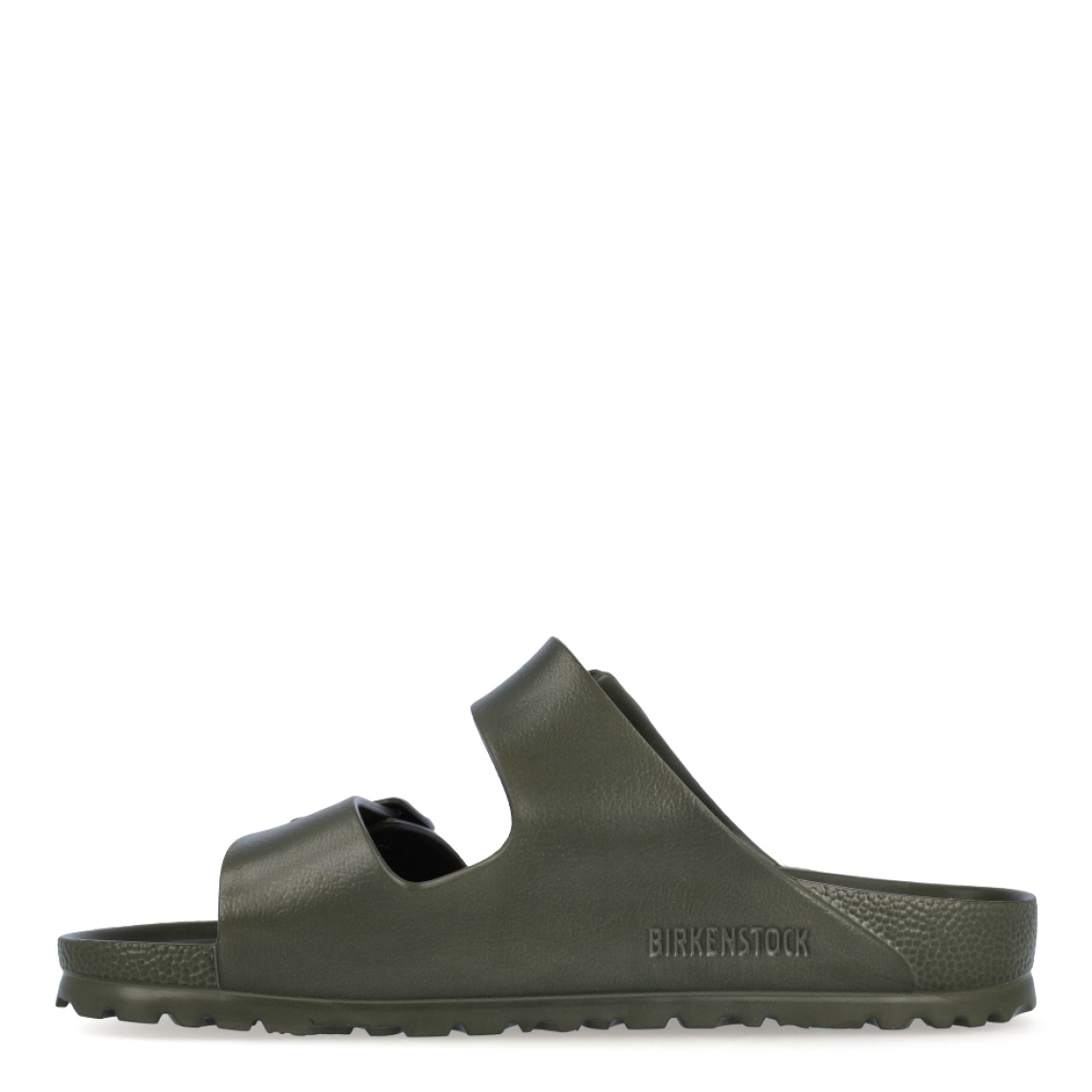 Sandalias de la marca Birkenstock, modelo ARIZONA EVA. Sandalias elaboradas en neopreno de alta calidad color verde oscuro. Cierre de las sandalias con dos hebillas, en el empeine y la pala. Sandalias Birkenstock con suela plana y de goma. Estas sandalias Birkenstock ARIZONA EVA son un complemento clásico para tus looks de temporada. No te puede faltar en el armario.