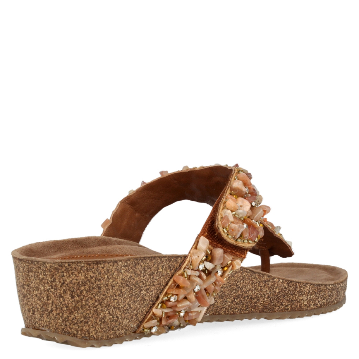 Esclava de pedreria de la marca Itse, modelo Triana. Exterior de la sandalia decorado con pedrería de colores naranja. Interior de la sandalia de piel de color marrón. Sandalia con cuña de 4 cm de altura, incluyendo 2 cm de plataforma. Sandalia con plantilla acolchada para garantizar el máximo confort. La sandalia de Itse, modelo Triana, es la sandalia perfecta para el verano. Es una sandalia cómoda y versátil para cualquier plan de verano.