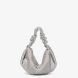 Bolso de la marca Abbacino, modelo LUCY. Bolso elaborado con malla metálica color plata. Interior en forro textil. Cierre del bolso con cremallera. Bolso Binnari con asa de mano drapeada y una práctica bandolera de cadena de quita y pon. Medidas del bolso: alto 12cm y ancho 24cm. Este bolso Binnari LUCY es un complemento ideal para lucir tus looks de día y noche.