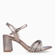 Sandalias de la marca Tamaris, modelo DARIA. Elaboradas en piel color bronce con detalle de tiras cruzadas en pala. Interior en piel color nude y cierre con hebilla en tobillo. Sandalias Tamaris con tacón de 7cm de altura. Estas sandalidas Tamaris DARIA son ideales para ti!