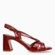 Sandalias de la marca Tamaris, modelo RUBÍ. Exterior en charol color rojo con detalle de tiras cruzadas en la pala. Interior en piel color nude. Cierre de las sandalias Tamaris con hebilla en tobillo y tacón de 7cm de altura. Estas sandalias Tamaris RUBÍ son ideales para tus eventos importantes, con ellas lucirás un estilo único!