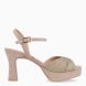 Sandalias de la marca Unisa, modelo OJEDA. Exterior en piel color beig con pala dorada. Interior en piel color nude. Cierre de sandalias Unisa con hebilla en tobillo y un tacón de 8cm de altura. Estas sandalias Unisa OJEDA son un complemento clásico e ideal para lucir tus looks de esta temporada!
