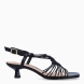 Sandalias de la marca Munné, modelo GREENWICH. Elaboradas en piel color negro, con detalle de tiras cruzadas en pala. Interior en piel color nude. Cierre de sandalias Munné con hebilla en tobillo y suela con tacón de 4cm de altura. Estas sandalias Munné GREENWICH, son un complemento ideal para tus looks en fiestas y eventos!