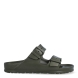 Sandalias de la marca Birkenstock, modelo ARIZONA EVA. Sandalias elaboradas en neopreno de alta calidad color verde oscuro. Cierre de las sandalias con dos hebillas, en el empeine y la pala. Sandalias Birkenstock con suela plana y de goma. Estas sandalias Birkenstock ARIZONA EVA son un complemento clásico para tus looks de temporada. No te puede faltar en el armario.