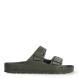 Sandalias de la marca Birkenstock, modelo ARIZONA EVA. Sandalias elaboradas en neopreno de alta calidad color verde oscuro. Cierre de las sandalias con dos hebillas, en el empeine y la pala. Sandalias Birkenstock con suela plana y de goma. Estas sandalias Birkenstock ARIZONA EVA son un complemento clásico para tus looks de temporada. No te puede faltar en el armario.