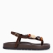 Sandalias de la marca Itse, modelo SAMOS. Sandalias elaboradas en piel color marrón oscuro. Sandalias esclavas con tiras cruzadas en pala y piedras en colores tierra. Cierre de sandalias Itse con hebilla. Suela plana y muy cómoda. Sandalias Itse SAMOS, complemento ideal para llevarlo en tu día día, con frescura y modernidad.