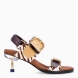 Sandalias de la marca 4CCCCEES, modelo OSHA LINE MID. Sanadalias elaboradas en piel color beig con estampado de cebra y tiras en pala. Cierre de las sandalias 4CCCCEES con hebillas. Estas sandalias tienen una versatilidad para el día y la noche, el stiletto LINE MID mantiene la comodidad gracias a su acolchado integrado y prácticos cierres. Suela con un tacón de 6cm de altura, en donde el stiletto OSHA se inspira en el movimiento y la dispersión de las gotas de agua. Este diseño de 4CCCCEES OSHA LINE MID es moderno y sofisticado, diseño ideal para t!