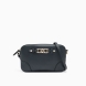Bolso de la marca Armani Exchange, modelo ASTRID. Bolso elaborado en piel color negro con grabado de logo en metal en la parte delantera. Bolso Armani Exchange con diseño funcional es el complemento idóneo para moverte por la ciudad con total libertad. Su silueta minimalista se adapta con naturalidad a tu ritmo diario, ofreciendo una estética limpia y contemporánea. Presenta un cierre de cremallera superior para resguardar tus pertenencias y una correa ajustable que permite llevarlo cruzado o al hombro. En el panel frontal destaca una placa metálica y unas costuras decorativas que definen su estructura. El acabado exterior resistente asegura una gran durabilidad y un aspecto impecable en cada uso. No te puede faltar en el armario. Medidas: alto 13cm y ancho 21cm.
