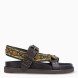 Sandalias de la marca ASH, modelo UNICA. Elaboradas en piel color marrón con estampado de figuras y colores simbolizando cultura africana. Interior en piel color negro. Cierre de sandalias ASH con hebilla en tobillo con aplicaciones en plateado. Suela de goma plana. Estas sandalias ASH UNICA son un complemento ideal en estilo y comodidad, una pieza que no te puede faltar en tus looks de temporada!