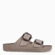 Sandalias de la marca Birkenstock, modelo ARIZONA EVA. Sandalias elaboradas en neopreno de alta calidad color taupe. Cierre de las sandalias con doble hebilla, en el empeine y la pala. Sandalias con suela plana y de goma. Estas sandalias Birkenstock ARIZONA EVA son un complemento clásico para esta temporada, podrás combinarlo con diferentes outifts y disfrutar de una comodidad máxima. No te puede faltar en el armario.