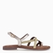 Sandalias de la marca Itse, modelo TANA. Exterior elaboradas en piel trenzada color oro con tiras cruzadas en pala. Interior en ante color marrón. Sandalias Itse con cierre de hebilla en tobillo. Suela plana de goma. Estas sandalias Itse TANA son ideales para esta temporada!