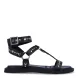 Sandalias de la marca Janet & Janet, modelo SASHA. Exterior en piel color negro con detalle de tachuelas doradas en tiras. Interior en piel color negro con estampado de logo marca. Cierre con hebilla. Suela de sandalias de goma y plana. Estas sandalias Janet & Janet tienen un diseño auténtico, que hará destacar tus looks a donde vayas!